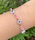 Pulsera cristal rosa con ojo turco