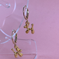Aretes huggies perrito de globo